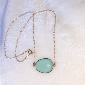 Chalcedony and gold tone chain necklace